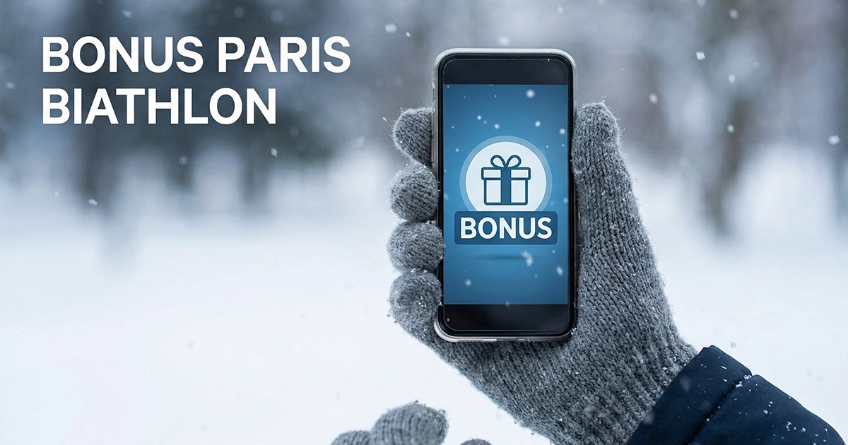 Main tenant un smartphone avec une notification de bonus de bienvenue paris sportifs sur fond hivernal